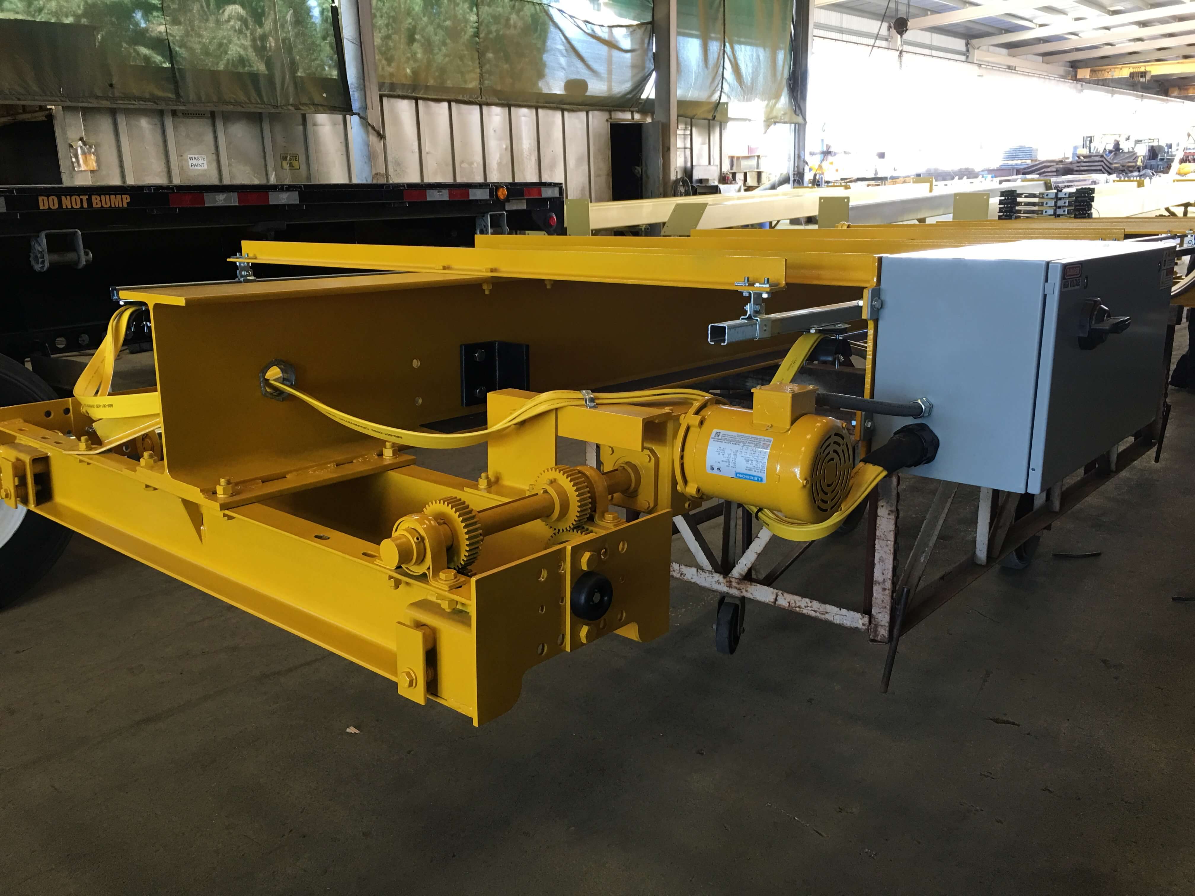 Top Riding Single Girder Crane - Yellow industrial overhead crane in manufacturing facility